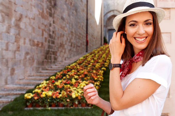 istock Petty woman at flowerbed 1533093995