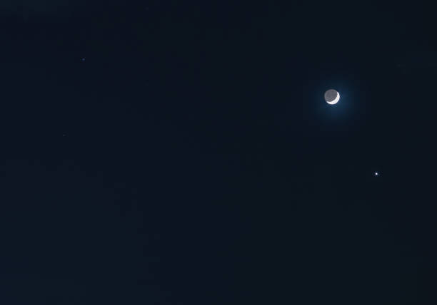 istock Night clear sky with crescent moon, stars, bright Venus and stars 1533136048