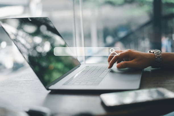 istock Concept of SEO (search engine optimization) for data searches. Woman's hands typing on laptop keyboard while using web browser to search the internet for information. 1533187389