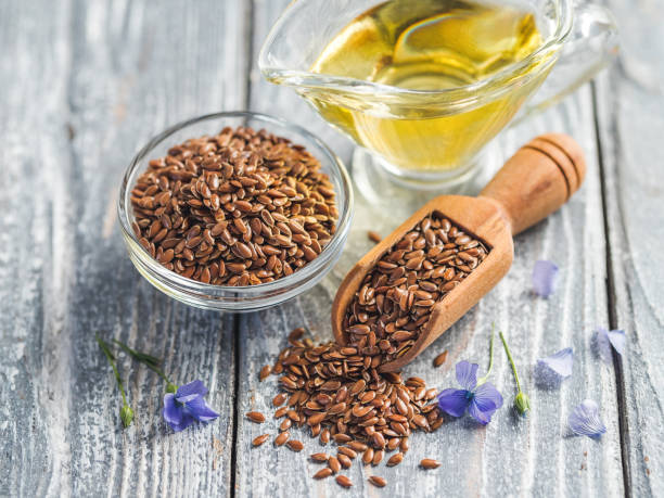 istock Flax seeds and flaxseed oil with copy space 1533193195