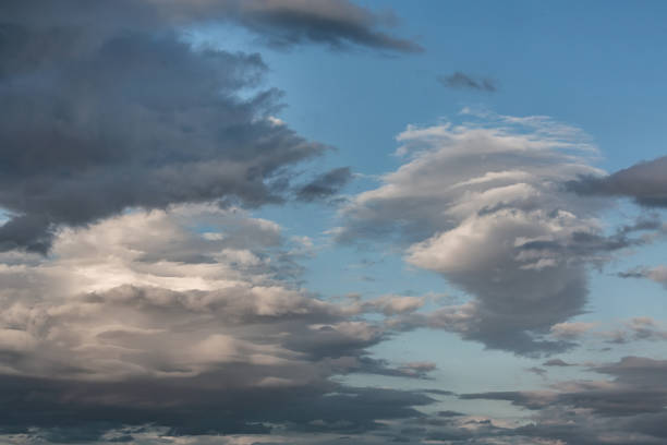 istock Dramatic cumulus clouds on summer evening. Atmosphere background or wallpaper 1533255659