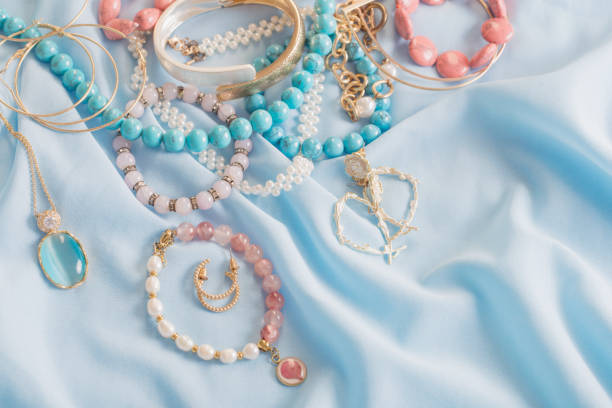 istock different women's jewelry on blue fabric 1533267455