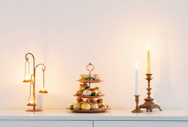 istock christmas golden decor with burning candles in white interior 1533268111