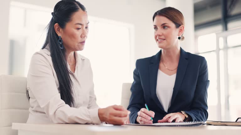 Financial advisor, compliance contract and business women in a finance consultation for b2b. Negotiation, corporate conversation and female work group in a conference room with a job discussion