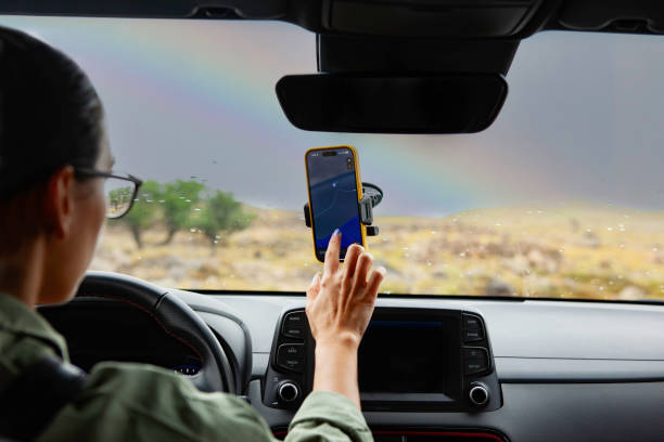 Woman Driver Checking Navigation in Car