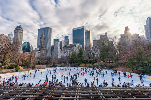Manhattan, NYC - December 27, 2013: New York Central Park. Ice Skating. NYC, USA