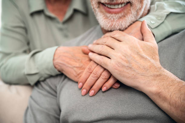 istock Selective focus on senior couple hands and sincere hugging 1533310029