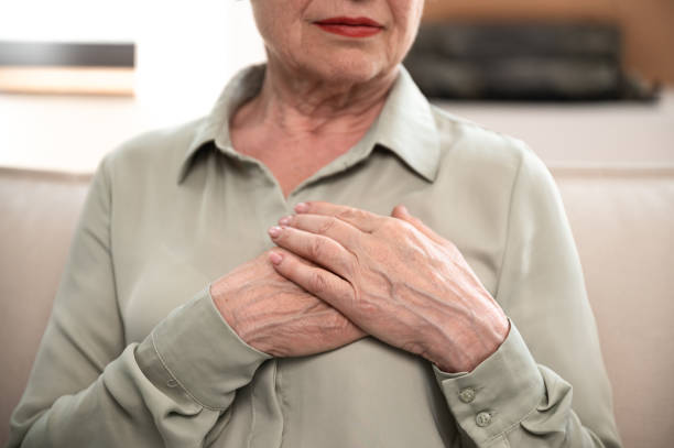 istock Mature elderly woman folded hand on chest 1533310030