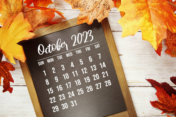 istock October 2023 monthly calendar with maple leaf on wooden background 1533347119