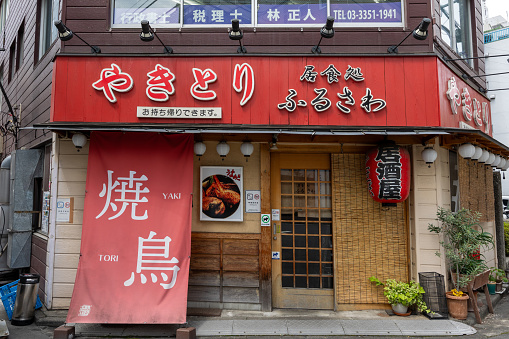 Tokyo, Japan - June 28, 2023 : Yakitori grilled chicken restaurant in Shinjuku, Tokyo, Japan.