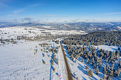 Altai mountains in winter: Seminsky Ridge and Seminsky Pass. Aerial view.