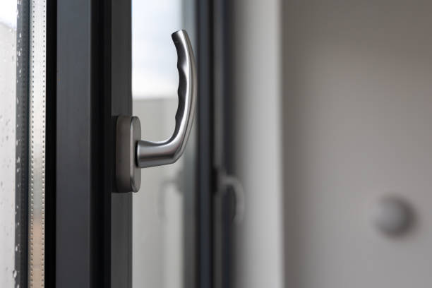istock Tilt and turn window handle in a large window in a public building. 1533385948