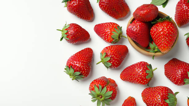 istock Flat lay composition with strawberries on white background, space for text. Summer sweet fruits and berries 1533420150