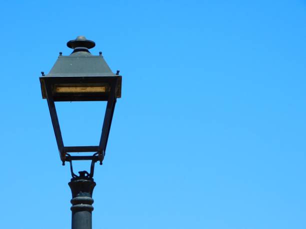 istock street lamp with a blue sky background 1533421781