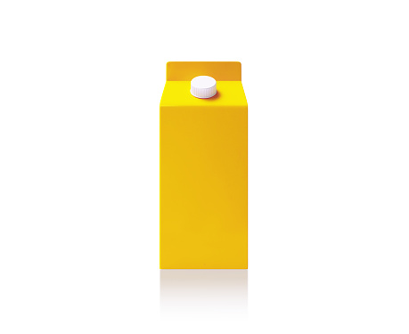 Yellow juice package on white background. Horizontal composition.
