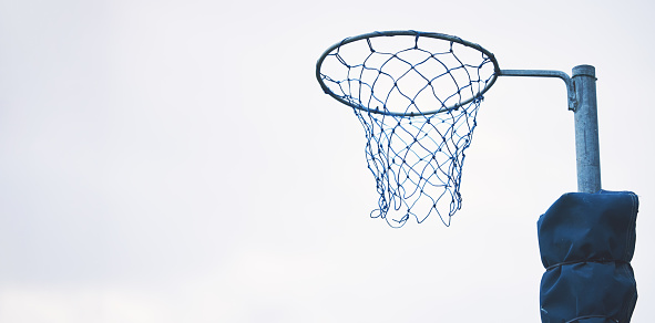 Sports, basketball and netball hoop in a park for fitness and a game at school or in public. Mockup, space and equipment for a sport in the air for playing, competition and professional match