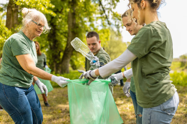 istock Volunteers cleaning a forest from garbage 1533435062