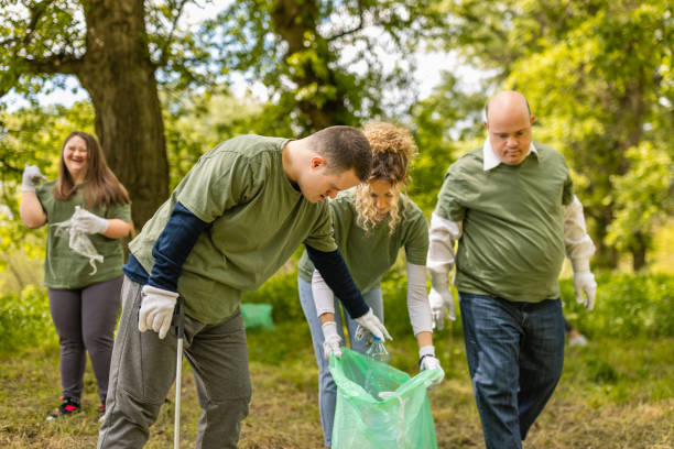istock Volunteers cleaning a forest from garbage 1533439273