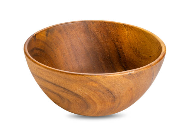 istock Closeup view of deep empty wooden bowl isolated on white baclground. 1533450466