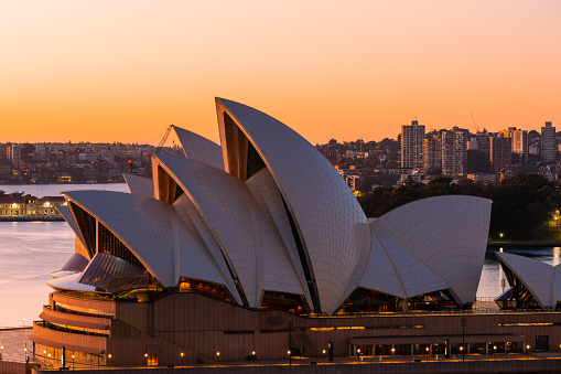 Sydney, Australia - July 9, 2023: Close-up view of Sydney Opera House with the golden light.