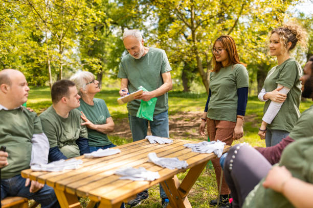 istock Group of activists resting after collecting trash 1533454615