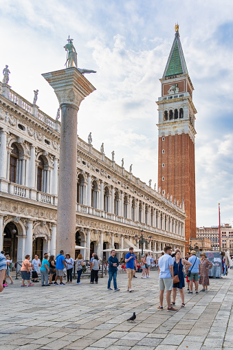 Venice, Italy - May 29 2023: Many tourists visiting Piazzetta San Marco and St Mark's Campanile in Venice.