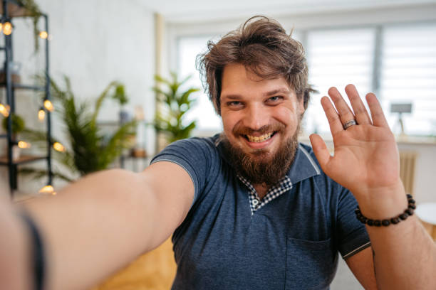 istock Young Man Having A Video Call At Home 1533521015