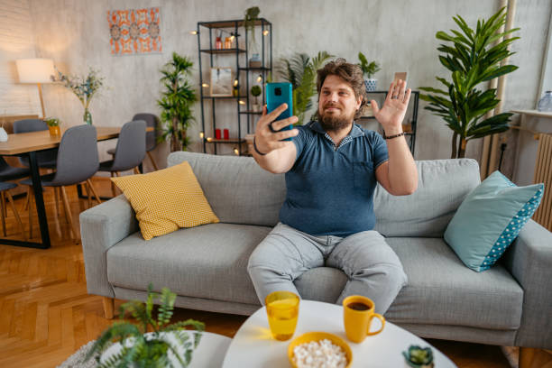 istock Young Man Having A Video Call At Home 1533533766