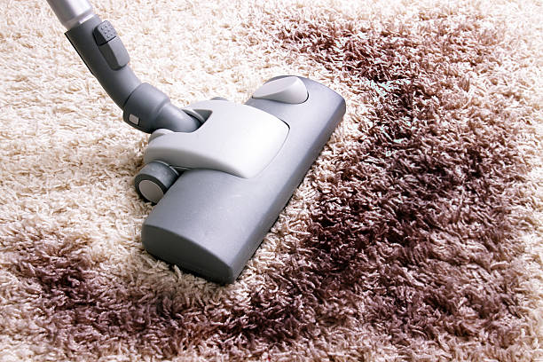 istock Very dirty carpet being vacuumed 153357998