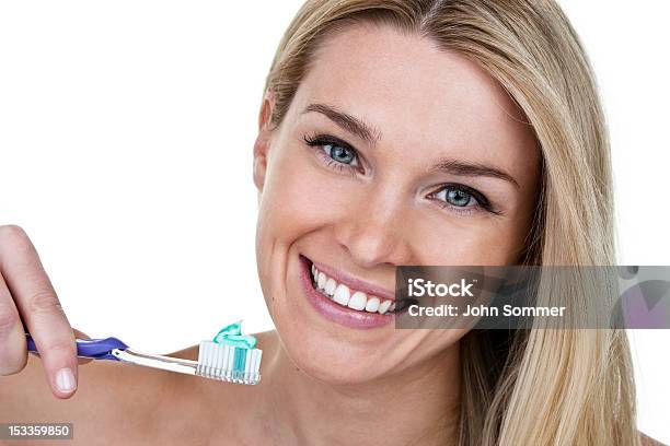 Woman Cleaning Teeth Stock Photo - Download Image Now - 20-24 Years, 20-29 Years, Adult