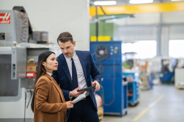 istock Production manager and business client in production 1533602364