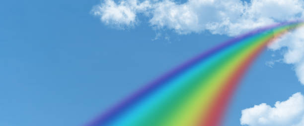 istock white cloud and blue sky and  rainbow background with copy space 1533618350