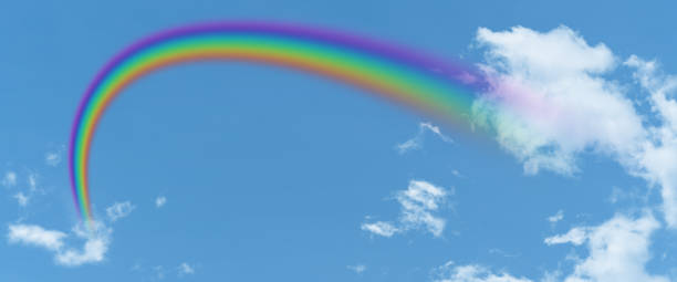 istock white cloud and blue sky and  rainbow background with copy space 1533618875