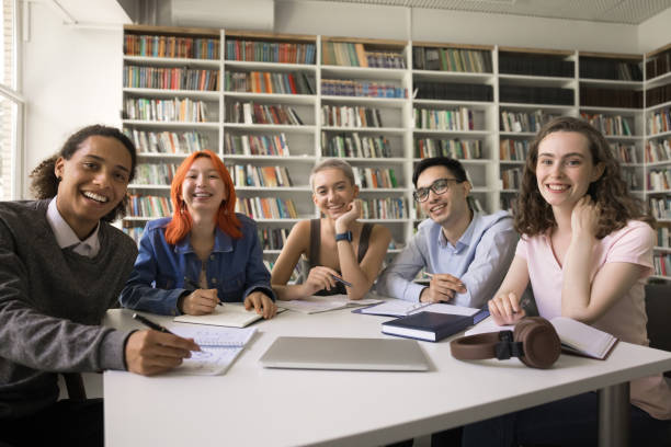 istock Happy diverse college fresh students posing for group portrait 1533629114