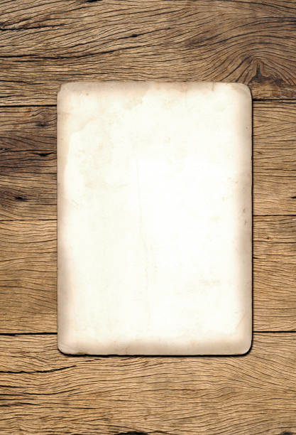 Old vintage paper texture background on wood board