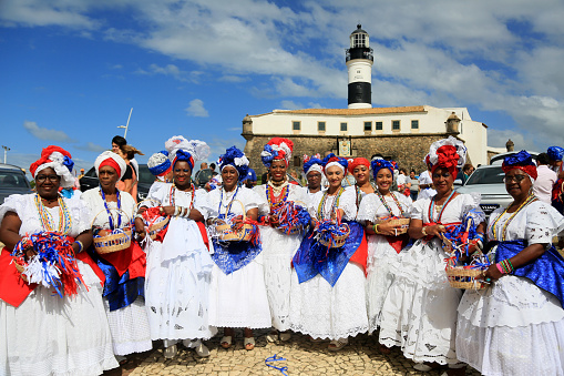salvador, bahia, brazil - july 4, 2023: baianas make the reception at Farol da Barra during the factory launch of the Chinese automaker BYD, which will open a factory in the city of Camacari.