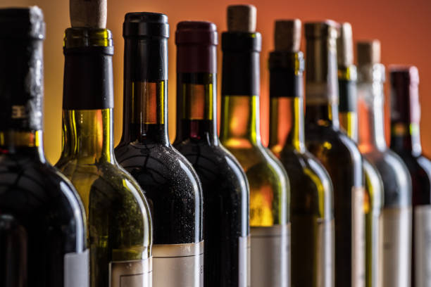 istock Line of wine bottles. Close-up. 1533652865