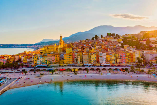 colorful old town Menton on french Riviera, France. Drone aerial view over Menton France Europe colorful old town Menton on the french Riviera, France. Drone aerial view over Menton France Europe. pinus pinea photos stock pictures, royalty-free photos & images