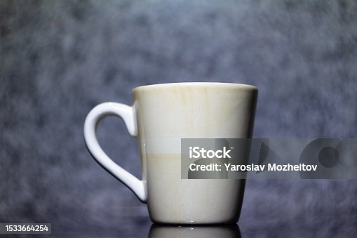 istock light ceramic cup on the background of a stone tabletop 1533664254