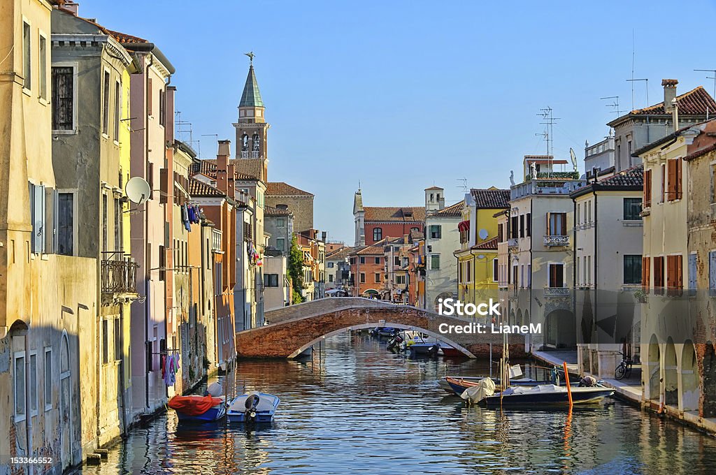 Great water view of Chioggia with vintage cabins and bridge Chioggia, little Venice in Italy Chioggia Stock Photo