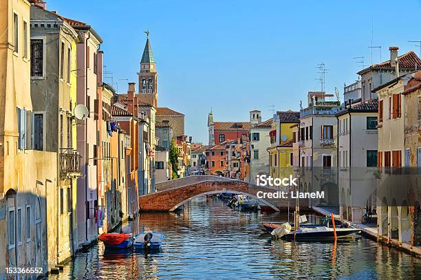 Great Water View Of Chioggia With Vintage Cabins And Bridge Stock Photo - Download Image Now