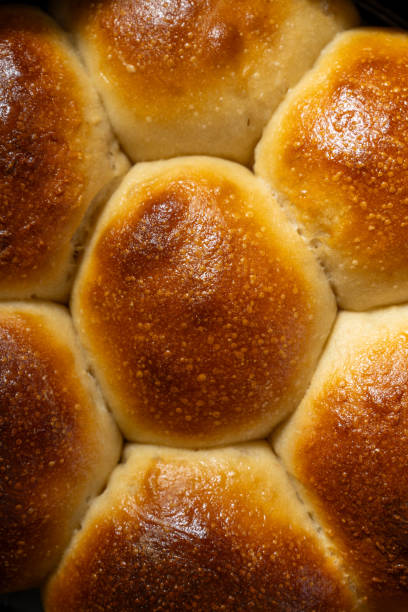 istock Sourdough buns in a baking round pan, top view 1533691867