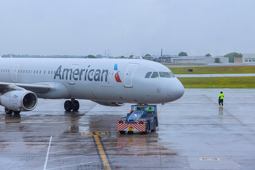 26 April Charlotte Airport NC USA Plane of American Airlines is being pushed back on runway while preparing for flight