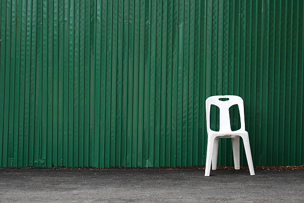 istock Green steel sheet and white chair 153371613