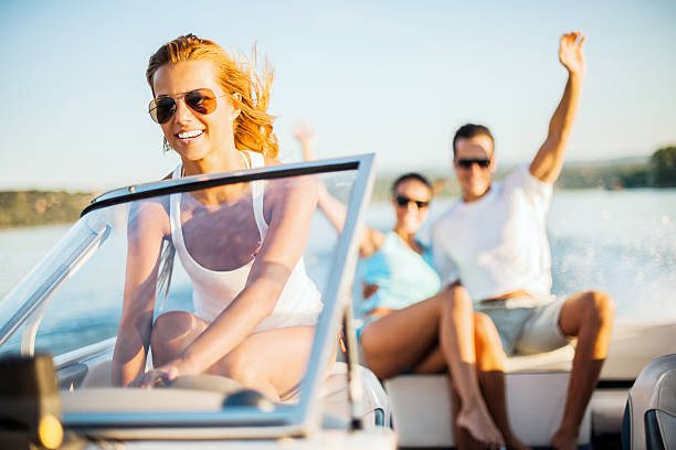 istock Young girl riding a speedboat 153371618