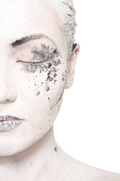 istock half the women in white face make-up 153372184