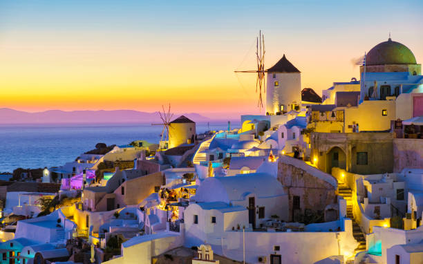 istock Oia Santorini Greece in the evening during sunset, traditional Greek village 1533745708