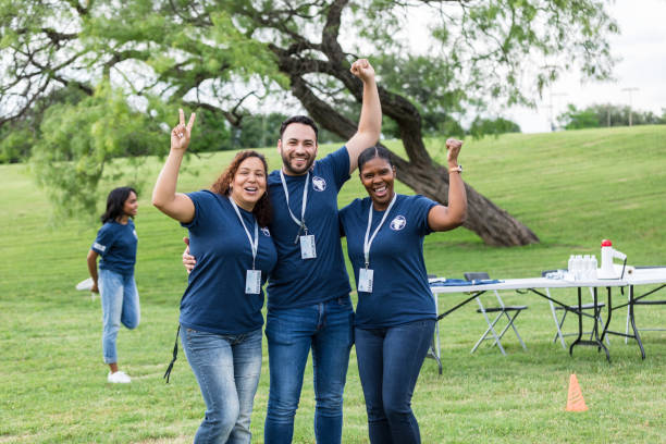 istock Three diverse friend cheer after successful day volunteering 1533752255