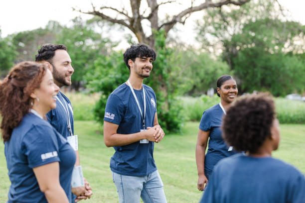 istock Diverse volunteers listen to instructions from unseen event organizer 1533752699