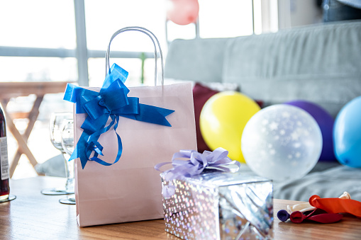 Close-up of gifts on a house birthday party